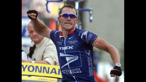 Armstrong celebrates winning the 10th stage of the Tour de France in 2001.