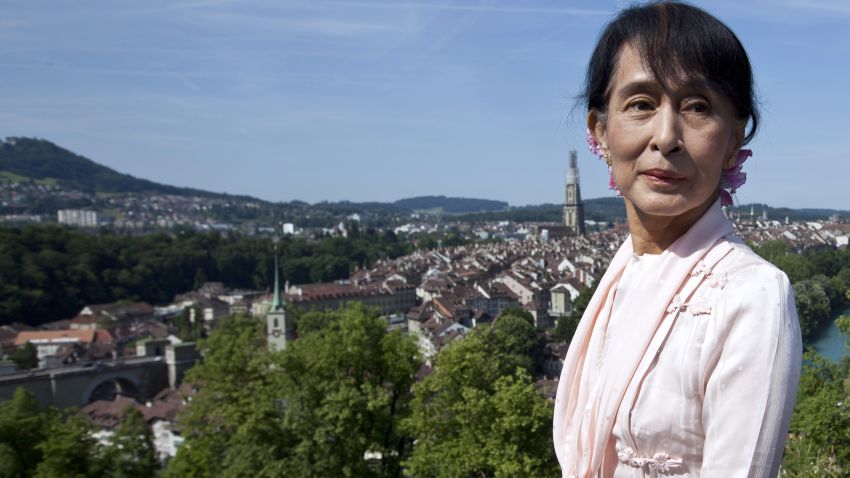 Myanmar opposition leader Aung San Suu Kyi poses in the Rose Garden in Bern on June 15, 2012 during a visit to Switzerland on her first trip to Europe since 1988. Suu Kyi will visit Switzerland, Norway, Britain, France and Ireland on her more than two-week tour, which will include a speech in Oslo to formally accept the Nobel Peace Prize that thrust her into the global limelight two decades ago. AFP PHOTO / POOL / YOSHIKO KUSANO (Photo credit should read YOSHIKO KUSANO/AFP/GettyImages) 