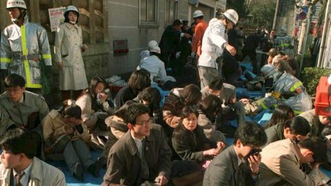 Subway passengers wait to receive medical attention after inhaling a nerve gas in Tokyo's metro system on March 20, 1995.