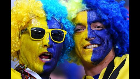 Painted Ukraine fans enjoy themselves before the Euro 2012 group D match between Ukraine and France.
