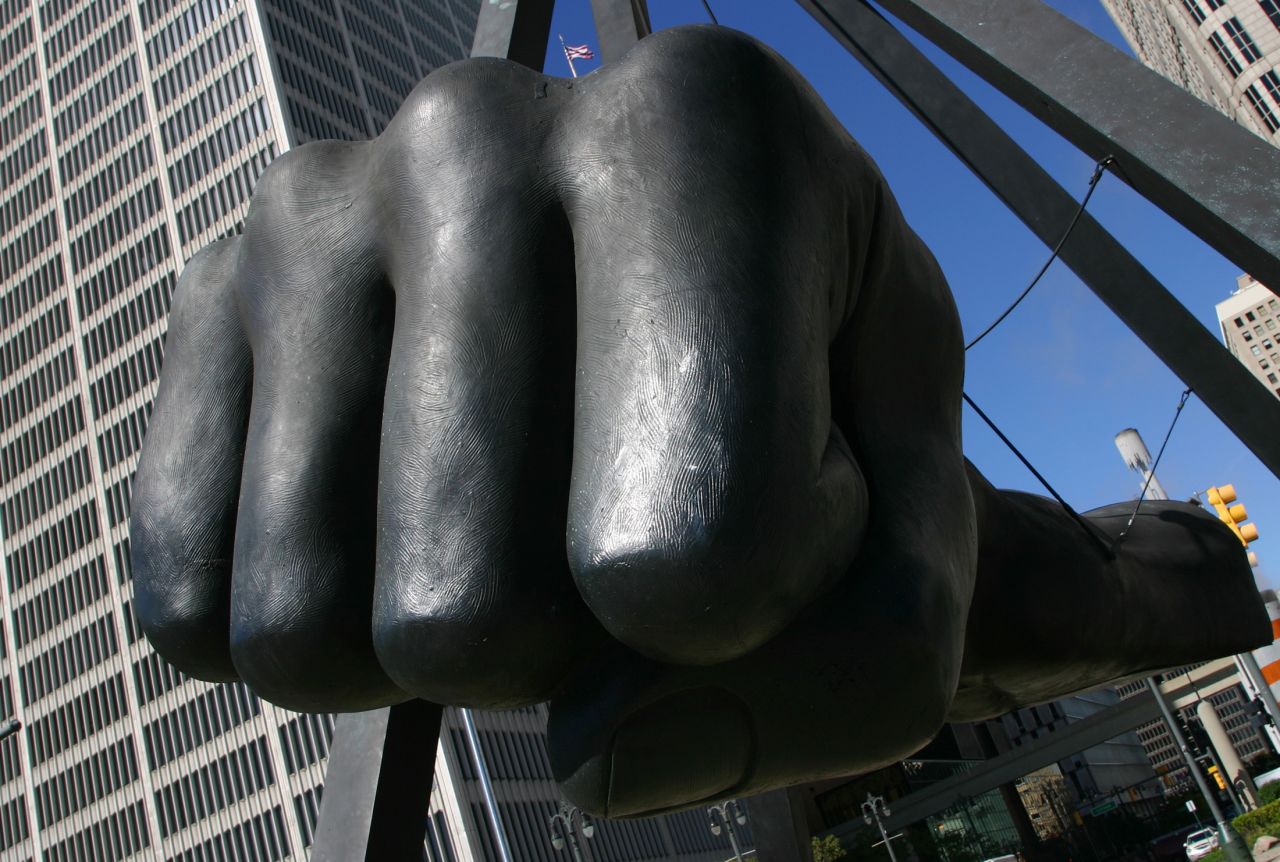 Dedicated in 1986, the Monument to Joe Louis was built in honor of the heavyweight boxing champion of the world from 1937 to 1949. The bronze fist is suspended 24 feet above the ground at a busy downtown intersection, representing the fighting spirit of the boxer as well as Detroit. 