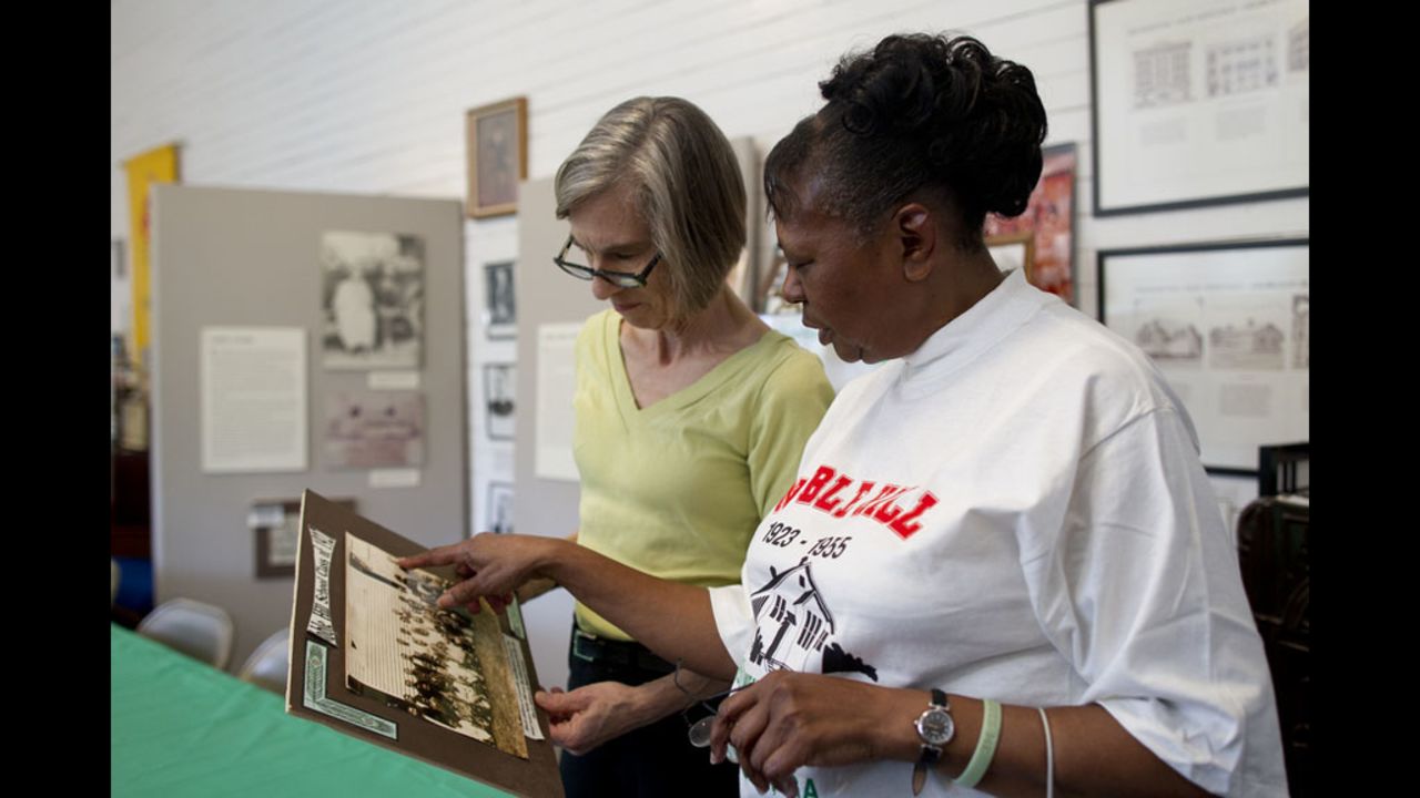 "You Need A Schoolhouse" author Stephanie Deutsch and Noble Hill-Wheeler Memorial Center curator Marian Coleman talked during a visit to the schoolhouse museum in March. It was one of several Rosenwald schools Deutsch visited since she began to research her book about the schools.