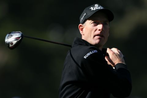 Jim Furyk of the United States watches his tee shot on the 10th hole during the second round.