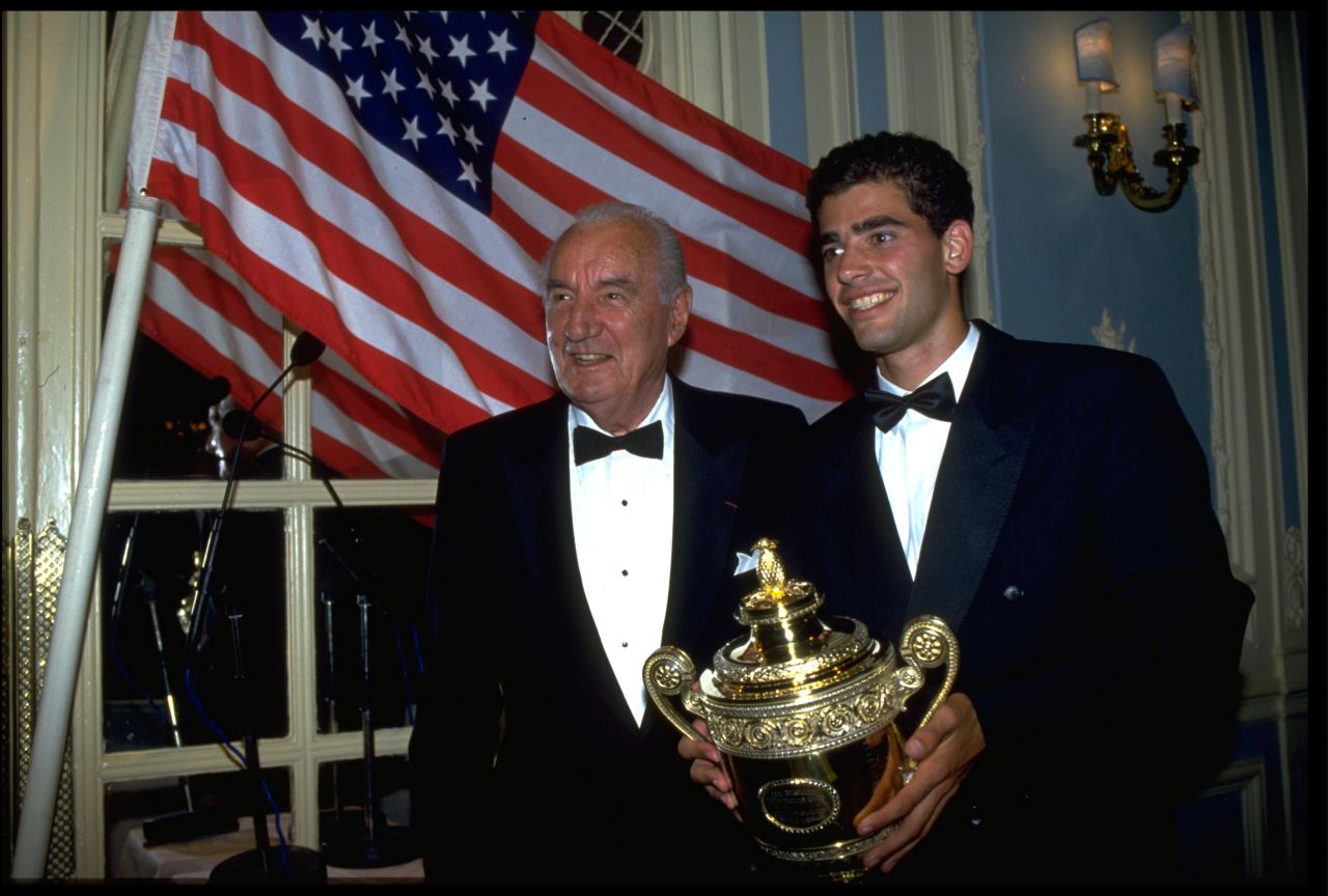Sampras won his first Wimbledon trophy in 1993, and is pictured here with Britain's last male winner Fred Perry, who collected his third title at SW19 in 1936.