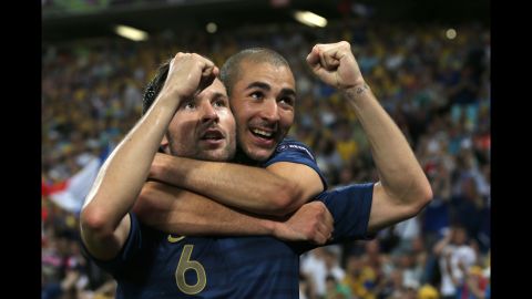 Yohan Cabaye of France celebrates a goal with Karim Benzema of France during the Ukraine-France matchup.