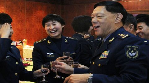 People's Liberation Army (PLA) Air Force fighter pilot Liu Yang, center in a 2010 photo, will be China's first female 'taikonaut.'