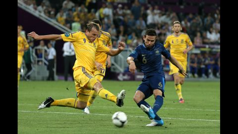 Yohan Cabaye of France scores the second goal past  Oleh Husyev of Ukraine during the match between Ukraine and France.