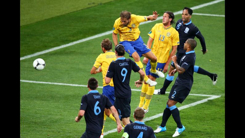 Olof Mellberg of Sweden scores Sweden's second goal against England in the Sweden-England matchup.