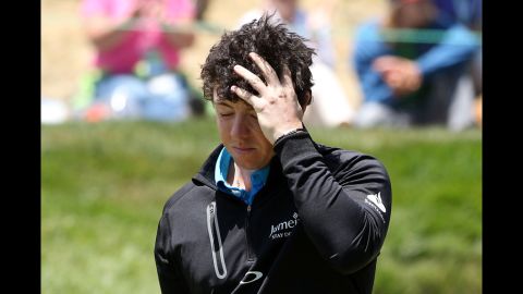 Rory McIlroy of Northern Ireland walks off the eighth green during the second round.