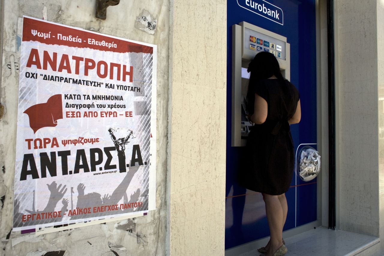 A left wing party election poster calls for Greece to pull out of the European Union and euro, on June 13, 2012 in Athens, Greece. Some Greeks have been withdrawing their money from the country's banks to protect themeselves from the crisis.