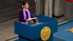 OSLO, NORWAY - JUNE 16:  Nobel Laureate Aung San Suu Kyi speaks during a Nobel lecture at Oslo City Hall on June 16, 2012 in Oslo, Norway. Aung San Suu Kyi was awarded the Nobel Peace Price in 1991 but after being kept under house arrest for most of the past 24 years has not had a chance to receive it until now. (Photo by Ragnar Singsaas/Getty Images)