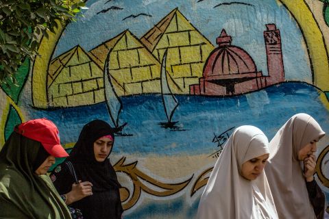 Egyptian women line up to cast their vote Saturday.