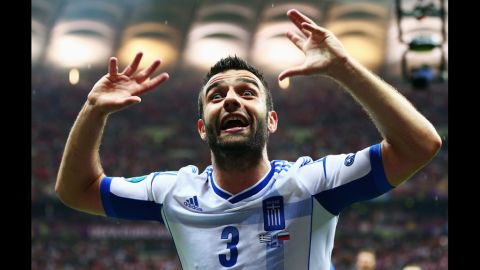 Giorgos Tzavelas of Greece celebrates during the match between Greece and Russia.