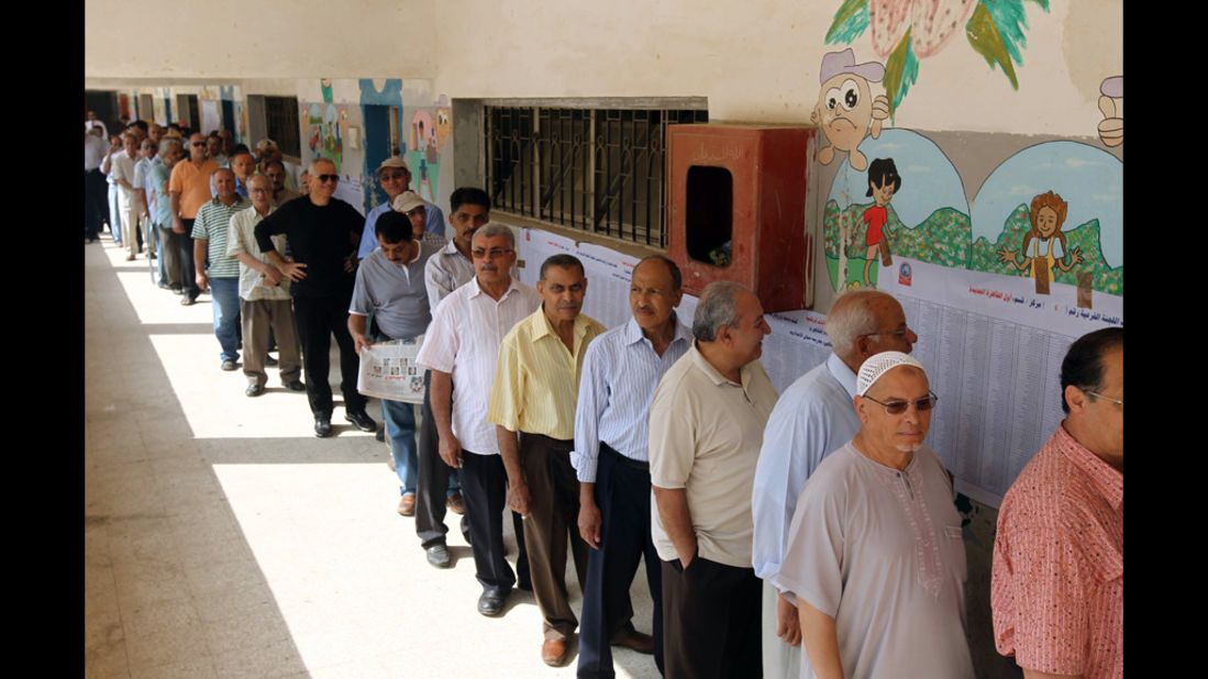 Egyptians queue outside a polling station in Cairo.