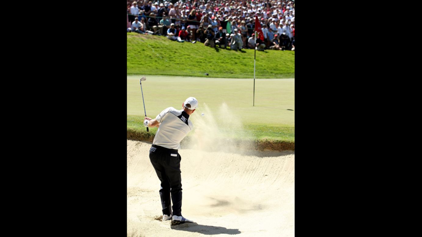 Jim Furyk of the United States plays a bunker shot on the second hole during the third round of the U.S. Open on Saturday, June 16. 