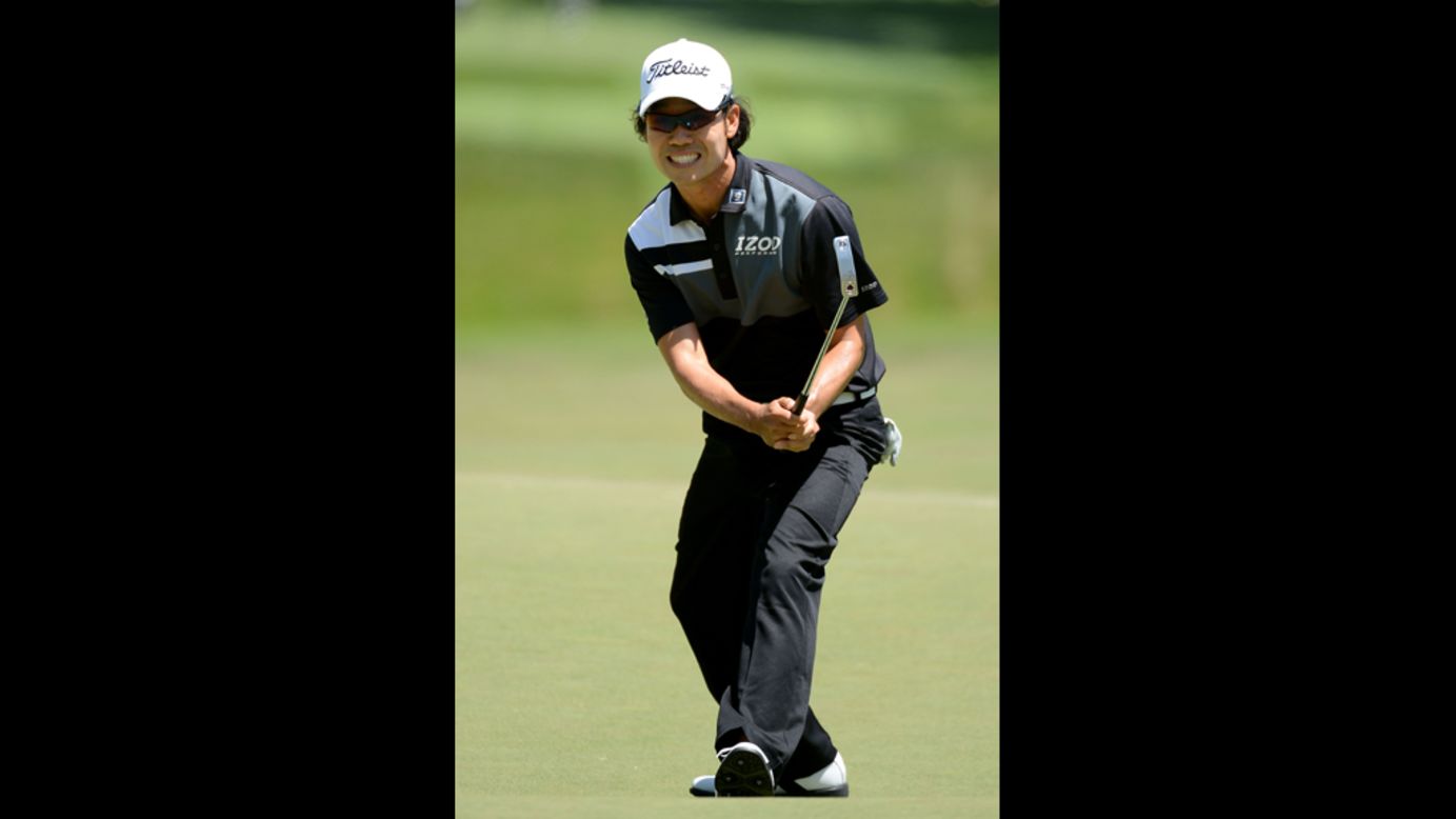 Kevin Na of the United States reacts to a missed birdie putt on the seventh hole.