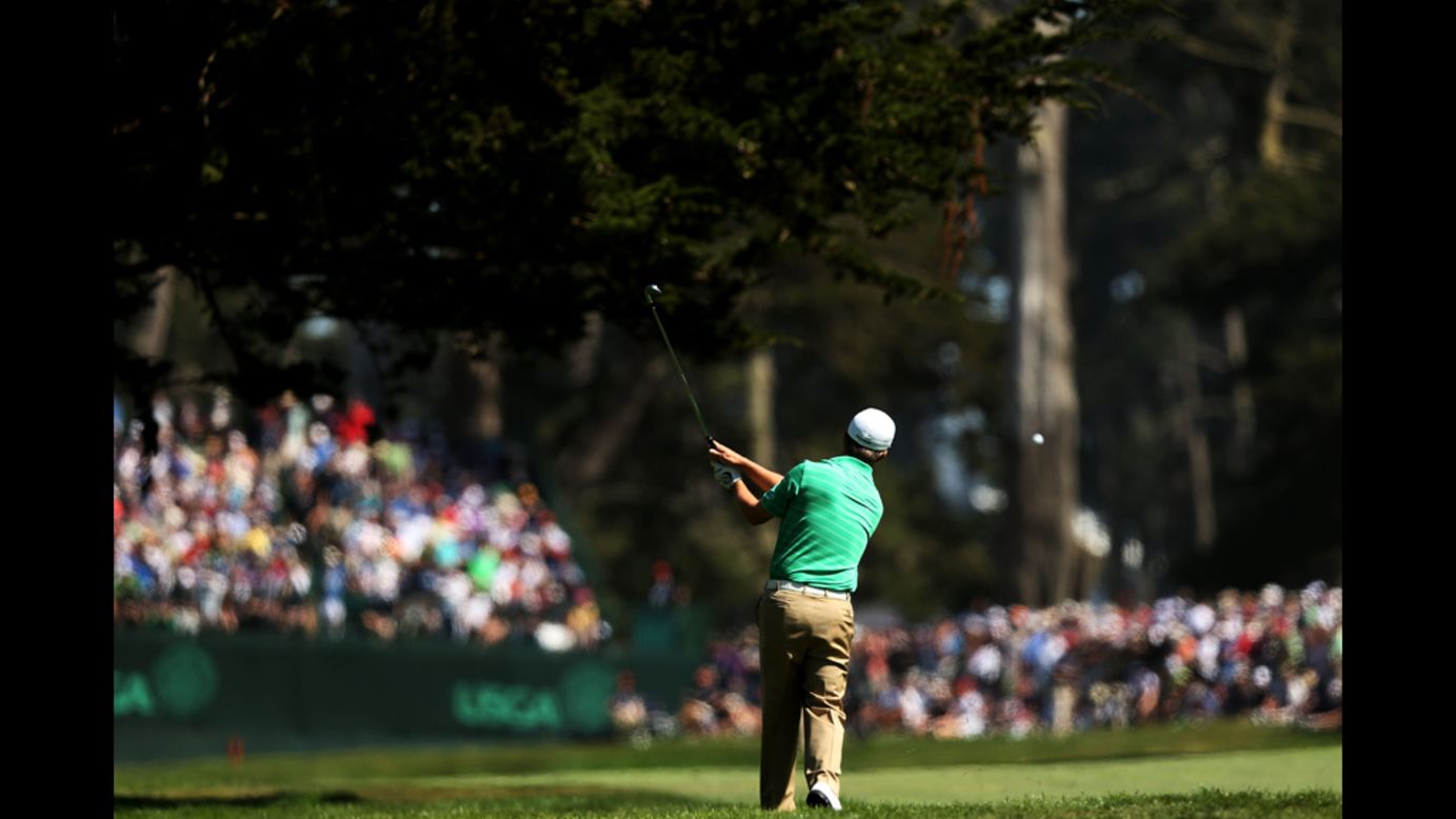 David Toms of the United States hits a shot on the fifth hole Saturday.