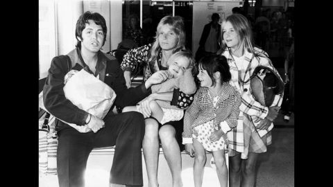 McCartney with his first wife, Linda Eastman, and their daughters Stella (from left), Mary and Heather, at Heathrow Airport in London in 1974.