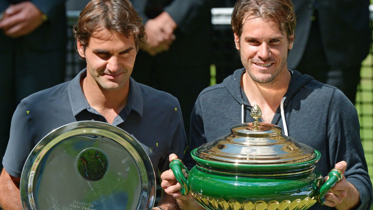 Tommy Haas with the winning trophy after beating Roger Federer in the final at Halle.