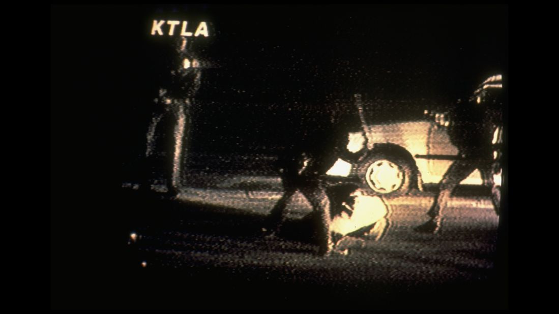 A frame from the video made by George Holliday from his balcony shows Los Angeles police officers beating King after he was stopped for a traffic violation on March 3, 1991. The video shows King being struck by police batons more than 50 times. More than 20 officers were present at the scene, most from the LAPD. King suffered 11 fractures and other injuries in the beating.