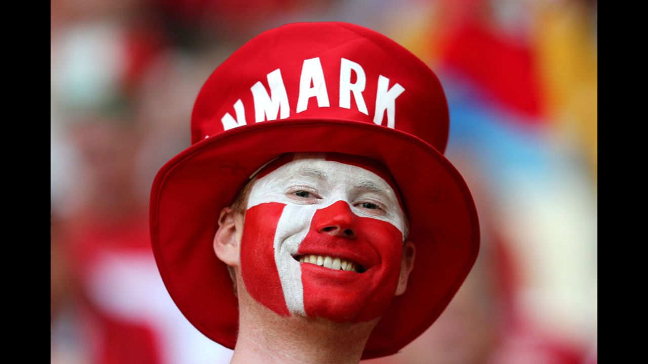 A Danish fan enjoys the atmosphere ahead of the team's match against Germany.