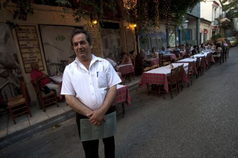 Mario Makris, a restaurant worker in the Psiri area of Athens, says business has dropped more than 60%.