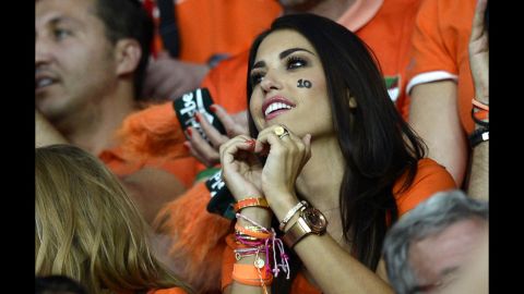 A Dutch fan makes a heart shape with her hands before the start of the team's match against Portugal.