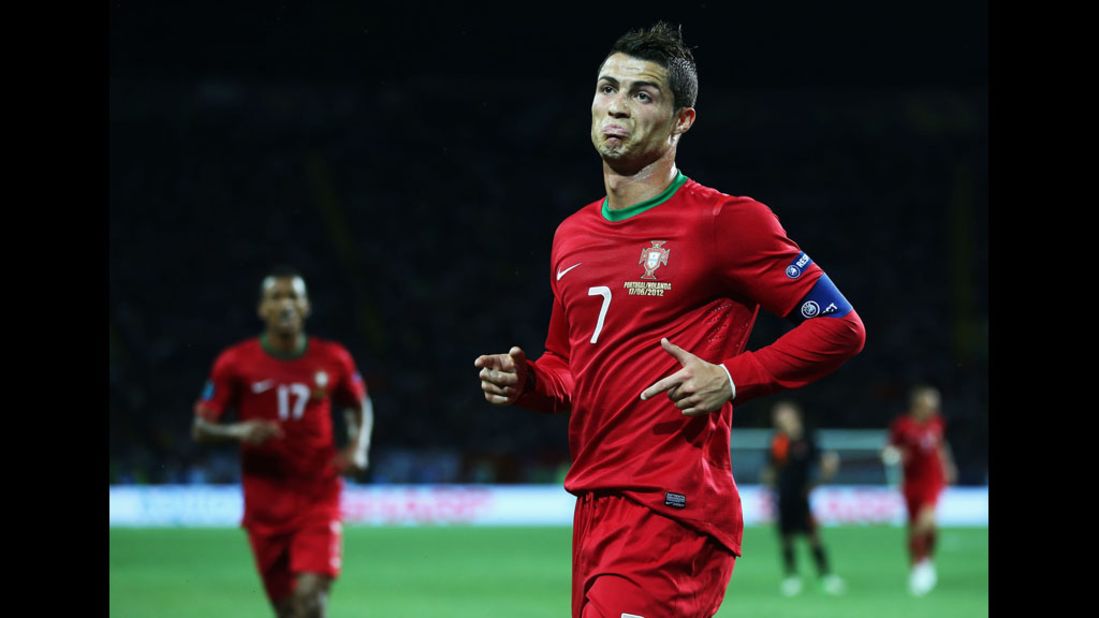 Cristiano Ronaldo of Portugal celebrates scoring the first goal against the  Netherlands.