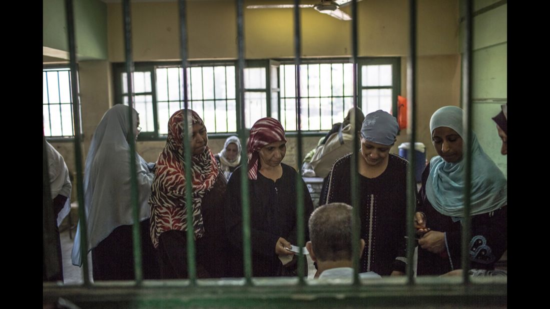 Women line up to vote at a polling station in Cairo, Egypt, on the second and final day of the run-off presidential election.