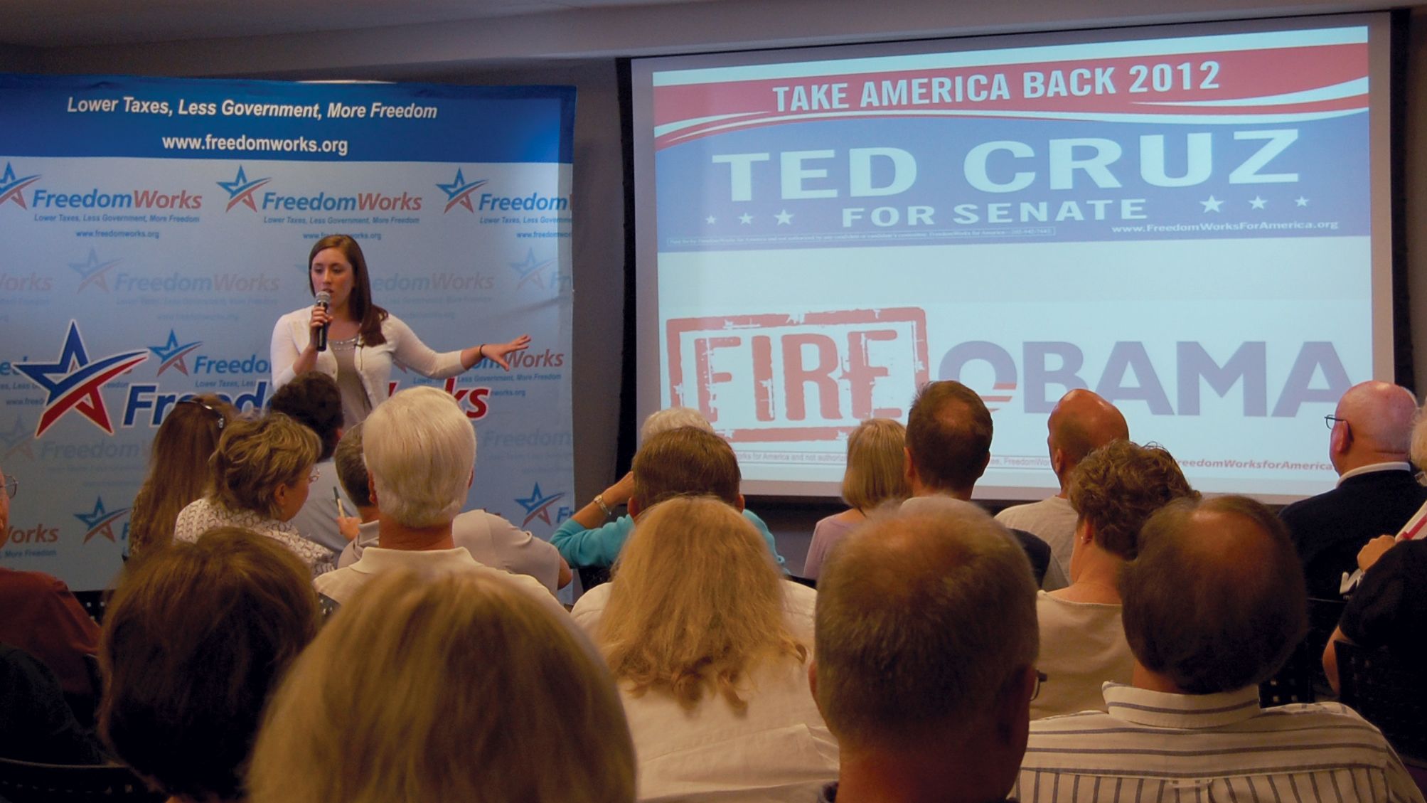 FreedomWorks' Amanda Shell shows activists examples of materials her organization designs, prints and distributes to local tea party groups.