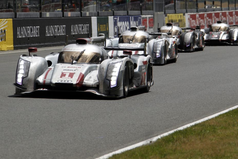 Audi made history at the Le Mans 24 hour race, with the R18 car becoming the first hybrid vehicle to win the endurance event.