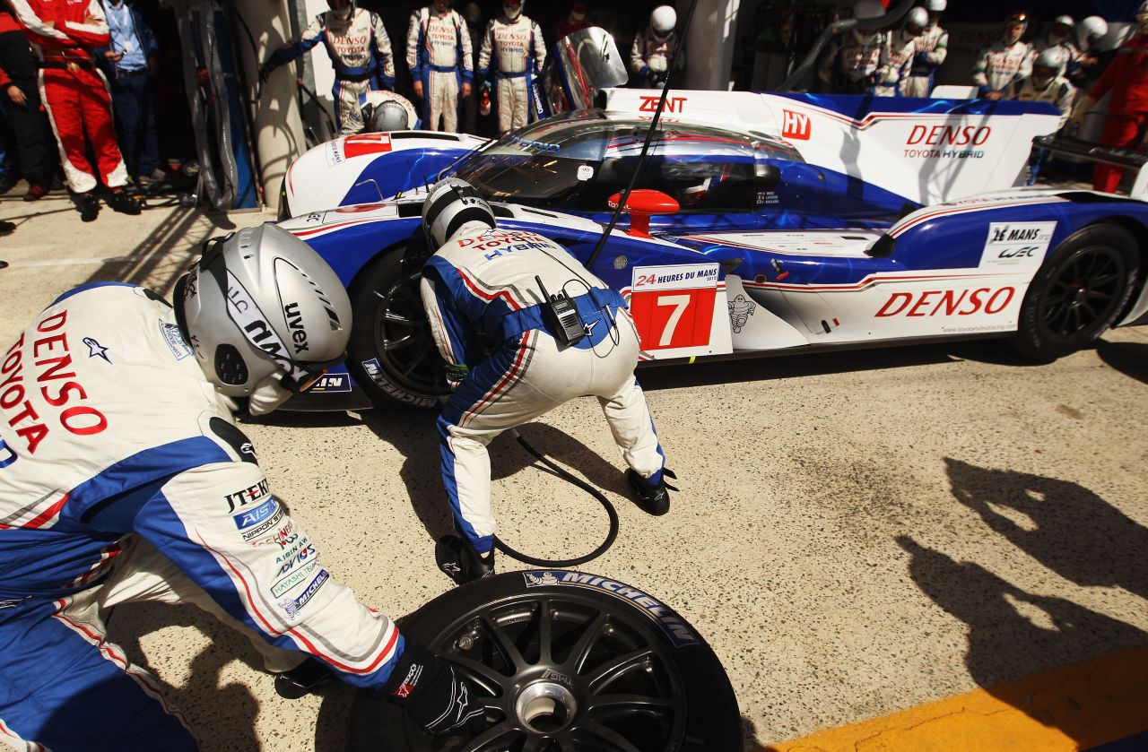 Davidson's Toyota team perform a pit stop. He was one of several ex-Formula One drivers who took part in the race.