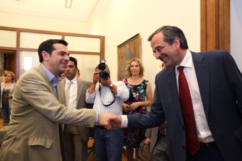 Antonis Samaras, right, meets with Greece's Syriza party leader Alexis Tsipras in an attempt to form a coalition government Monday. Tsipras immediately announced the party would go into opposition rather than support Samaras.