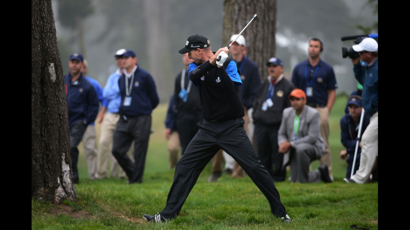 Jim Furyk of the United States reacts to a poor shot on the 12th hole.