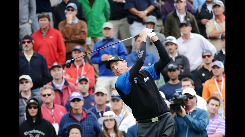 Jim Furyk hits his tee shot on the sixth hole.