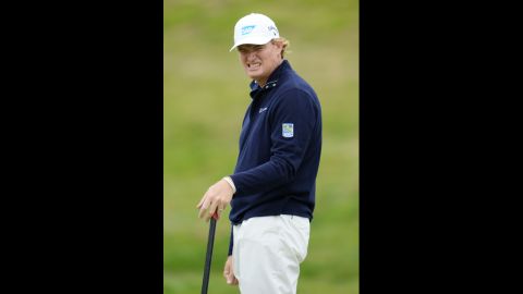 Ernie Els of South Africa reacts to a missed putt.