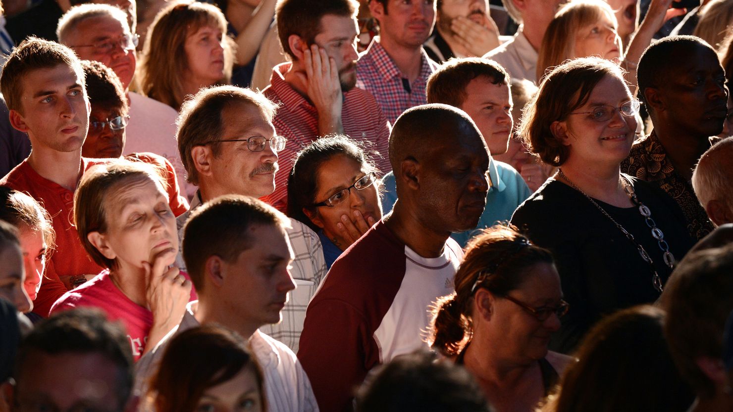 Supporters listen as President Barack Obama speaks at a campaign event last month in Des Moines, Iowa.