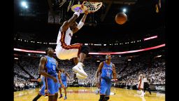 Chris Bosh of the Miami Heat dunks against the Oklahoma City Thunder in game three of the 2012 NBA Finals in Miami on Sunday, June 17. The Heat defeated the Thunder 91-85.