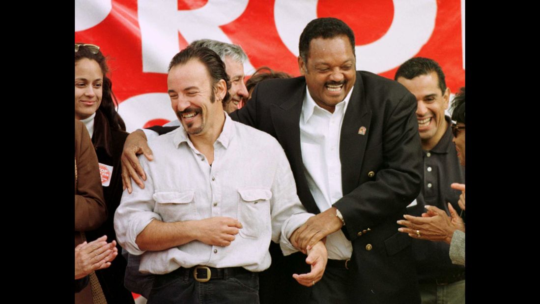 Springsteen is joined by the Rev. Jesse Jackson at a rally opposing Prop 209 in Los Angeles in 1996. The initiative was a ballot measure banning affirmative action by government in California.