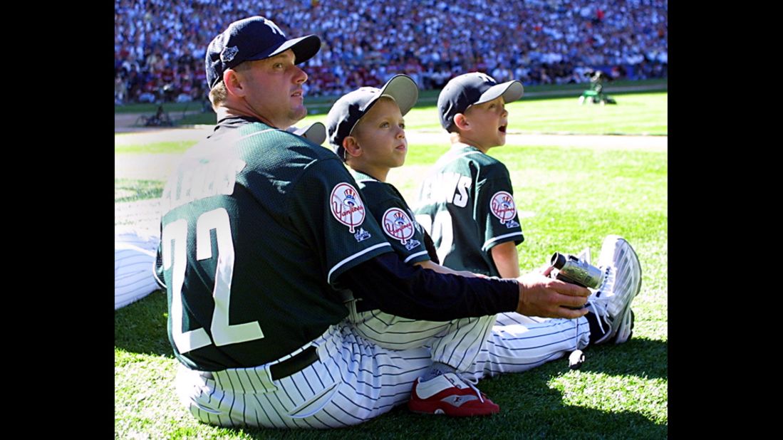 Clemens watches the 2001 Home Run Derby with his two sons at Safeco Field in Seattle.