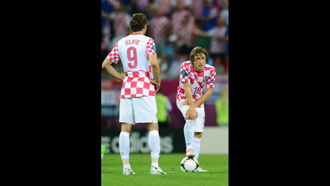 Croatia's Luka Modric looks on after Spain's Jesus Navas scores a goal.