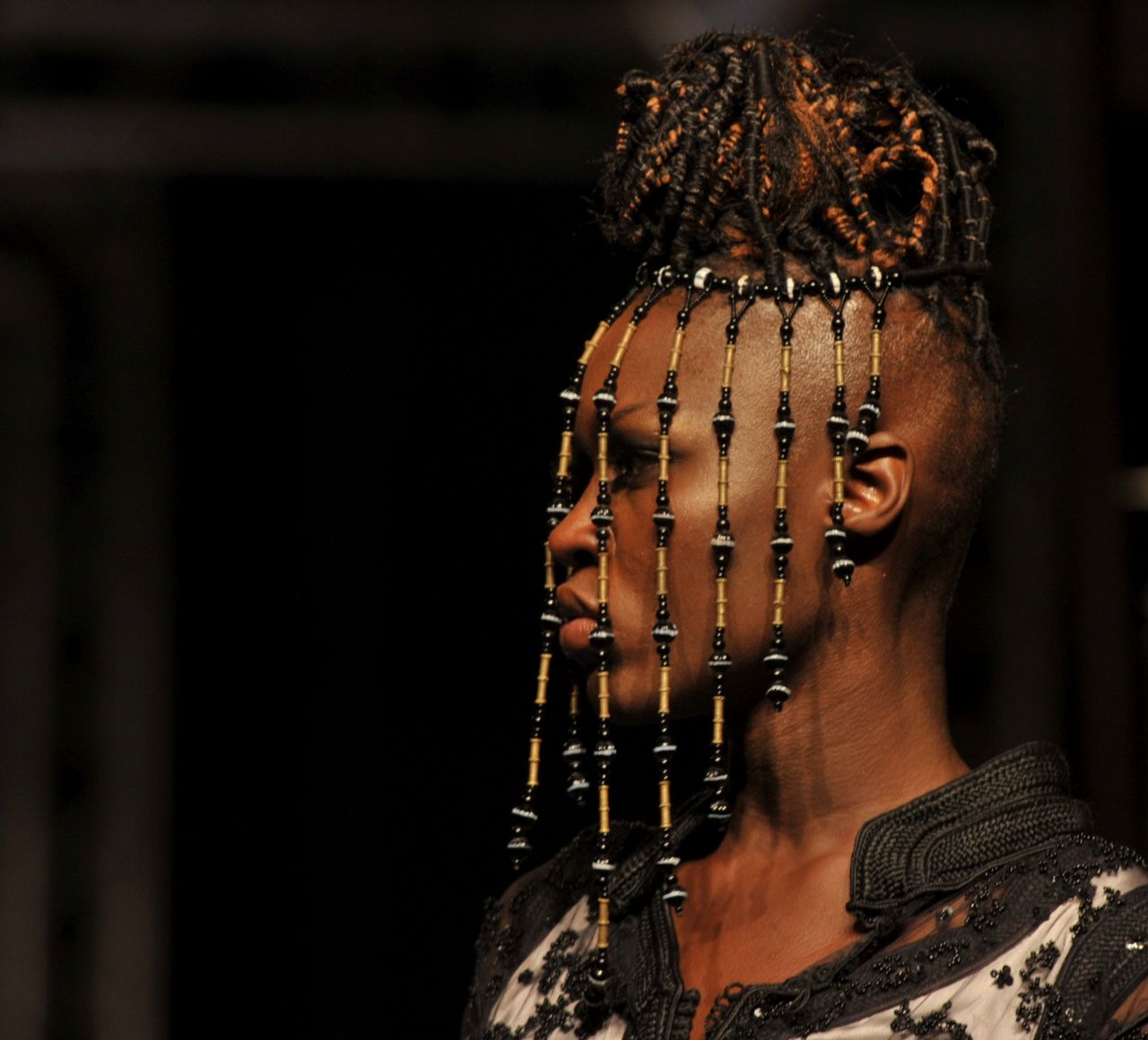 African designers presented their creations during the 10th annual Dakar Fashion Week in the Senegal capital.  Here, a model displays a tribal-inspired head piece by Moroccan designer Jamila Lafqir. 