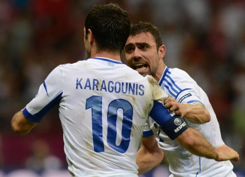 Giorgos Karagounis scored the winning goal against Russia as Greece reached the last eight of Euro 2012.
