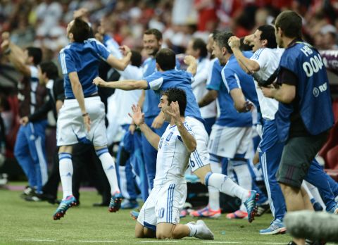 Karagounis, who asked to be substituted after being booked for diving, celebrated at the final whistle as the 1-0 win secured a clash with Germany.