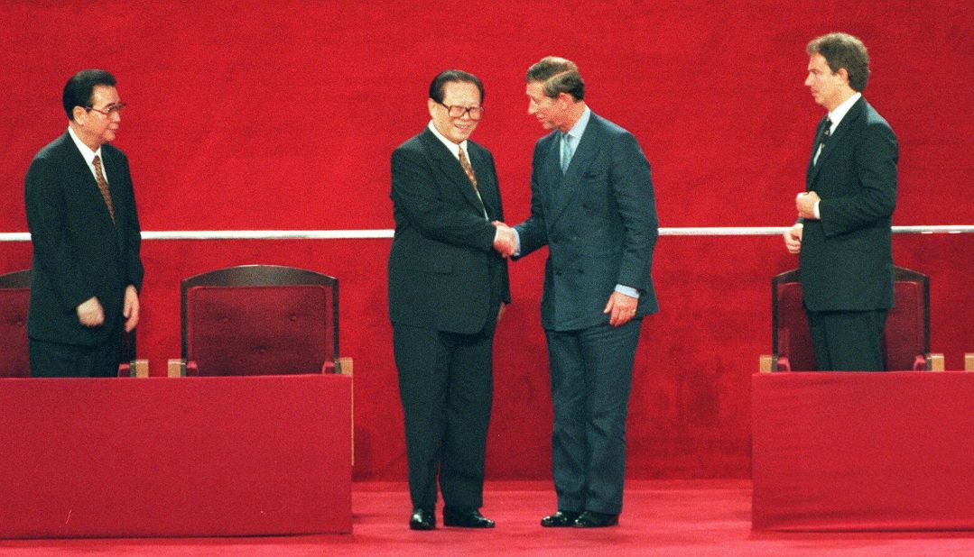 Chinese President Jiang Zemin (2nd L) shakes hands with Britain's Prince Charles (2nd R) following Hong Kong's transfer of sovereignty from British to Chinese rule.