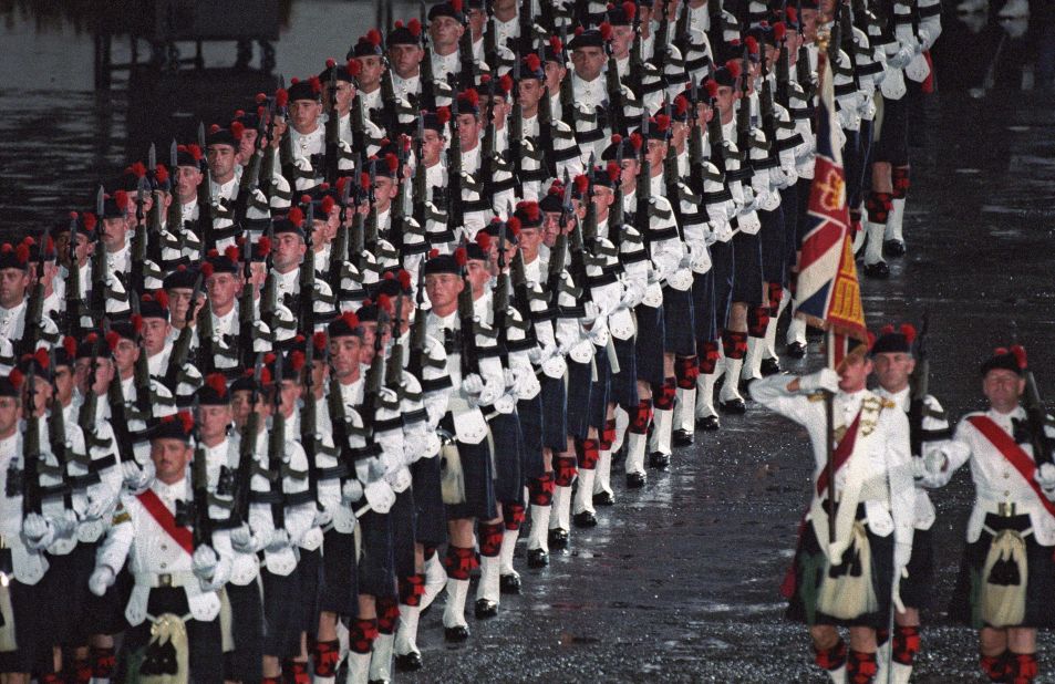 British solders participate in the British Military Farewell Ceremony at the HMS Tamar military base on June 30, 1997.