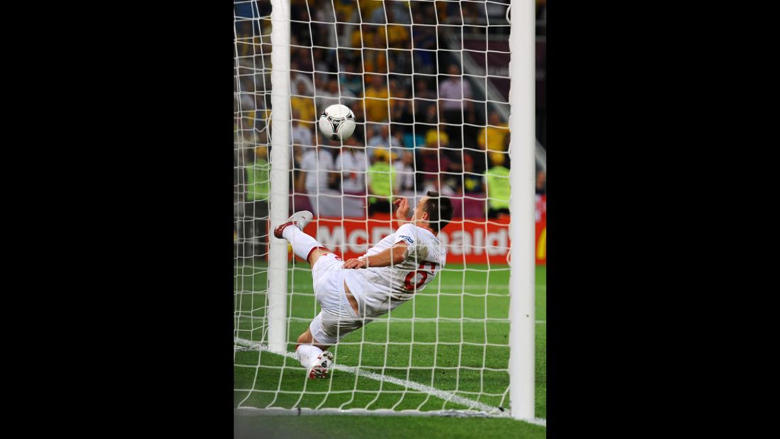 John Terry of England clears an effort from Marko Devic of Ukraine off the line during the match between England and Ukraine.