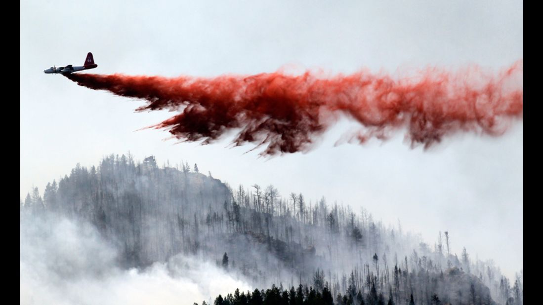 A heavy air tanker drops fire retardant on the blaze June 19. Its growth potential was "extreme," according to authorities.