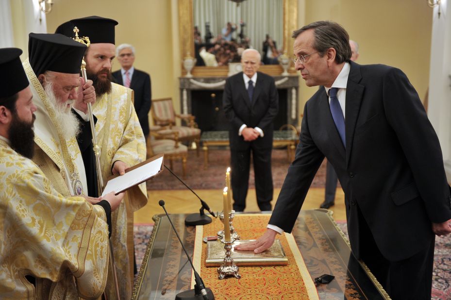 New Democracy leader Antonis Samaras is sworn in as Greece's new prime minister during a ceremony at the presidental palace in Athens on June 20, 2012.