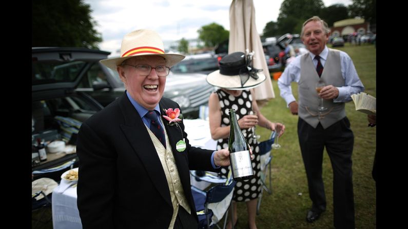 Visitors to Royal Ascot enjoy a picnic before the start of racing.